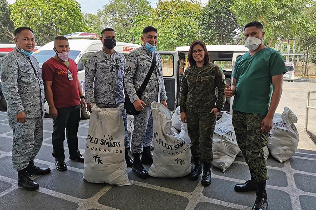 Frontline Armed Forces of the Philippines checkpoint officers also receive grocery packs from MVP Group’s Tulong Kapatid.