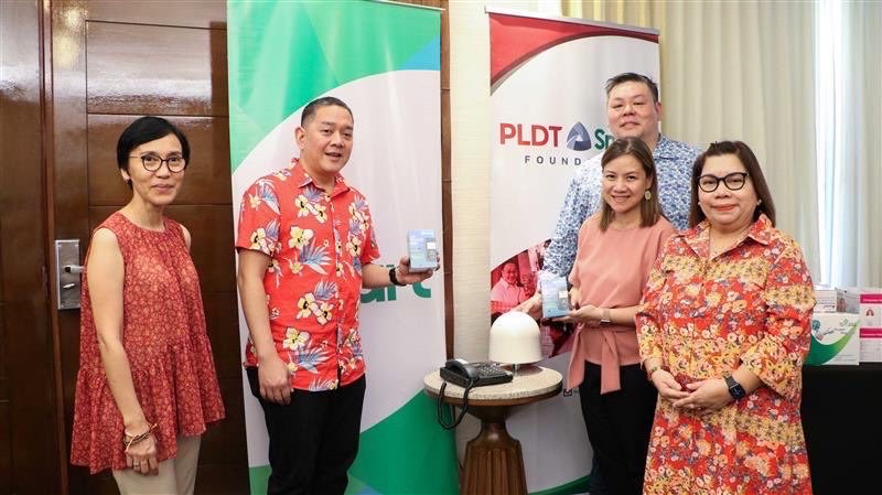 PLDT-Smart Foundation and Smart turn over satellite phones, load credits and anti-bacterial sanitizing dispensers to the Department of Tourism in Boracay.