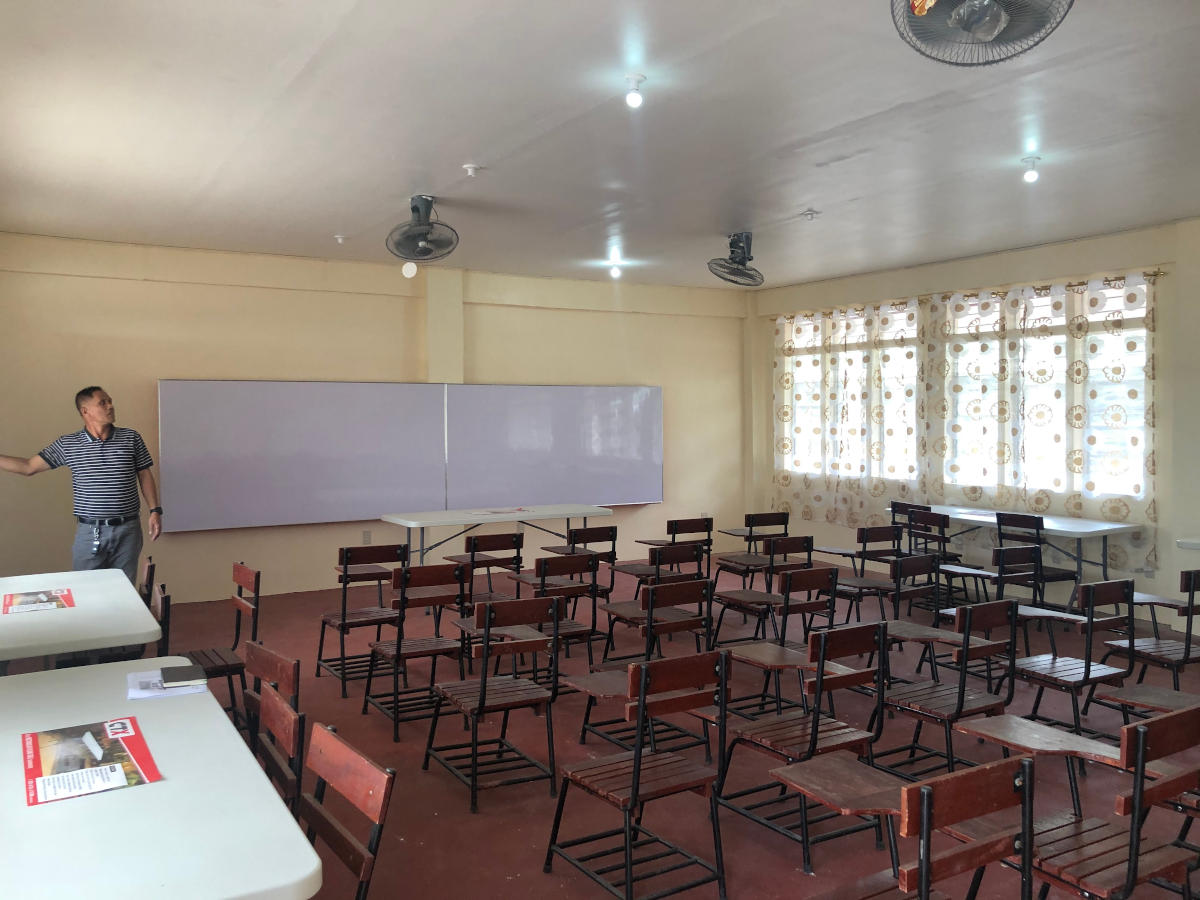 INSIDE VIEW OF THE COMPUTER LABORATORY. Since the curriculum on computer-related courses require both hands-on and theoretical applications, there will be occasions that the computer laboratory will become a lecture-type room as well. 
