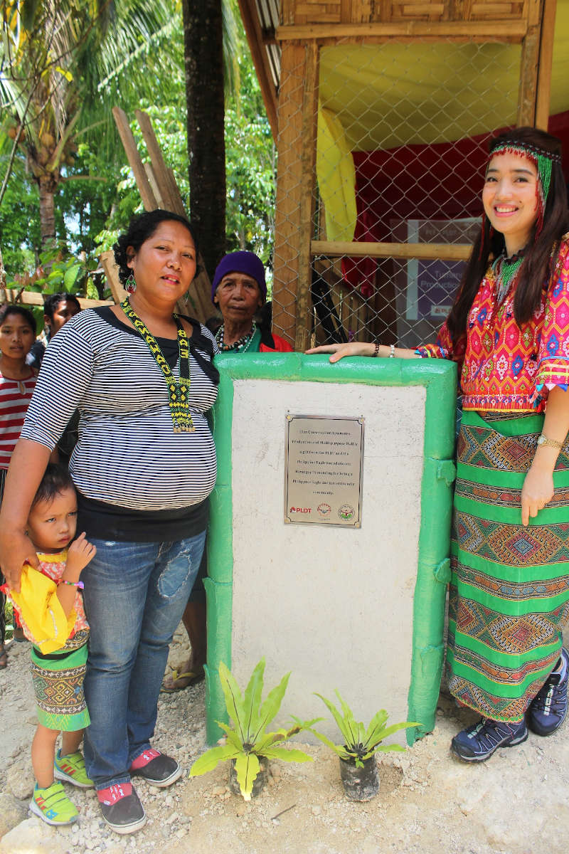 In 2019, SEBNAKA leader Mercy Panawad meets PLDT Community Relations Head Katherine Diaz De Rivera during the company's CSR efforts in partnership with the Philippine Eagle Foundation. 