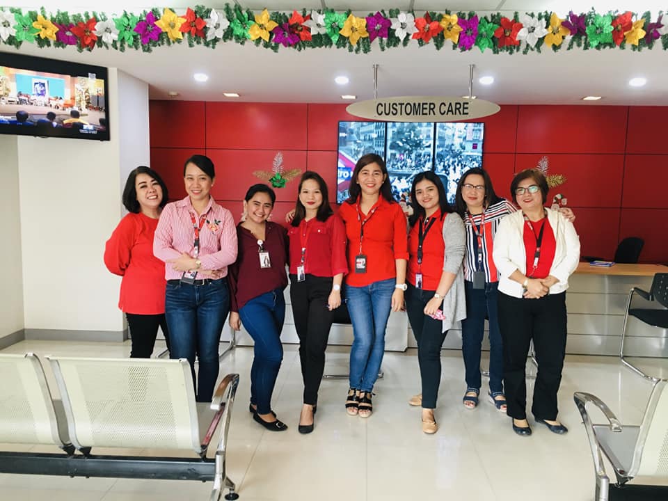 PLDT Malabon Sales and Service Center employees wear all red during the 91st Gratitude Day.