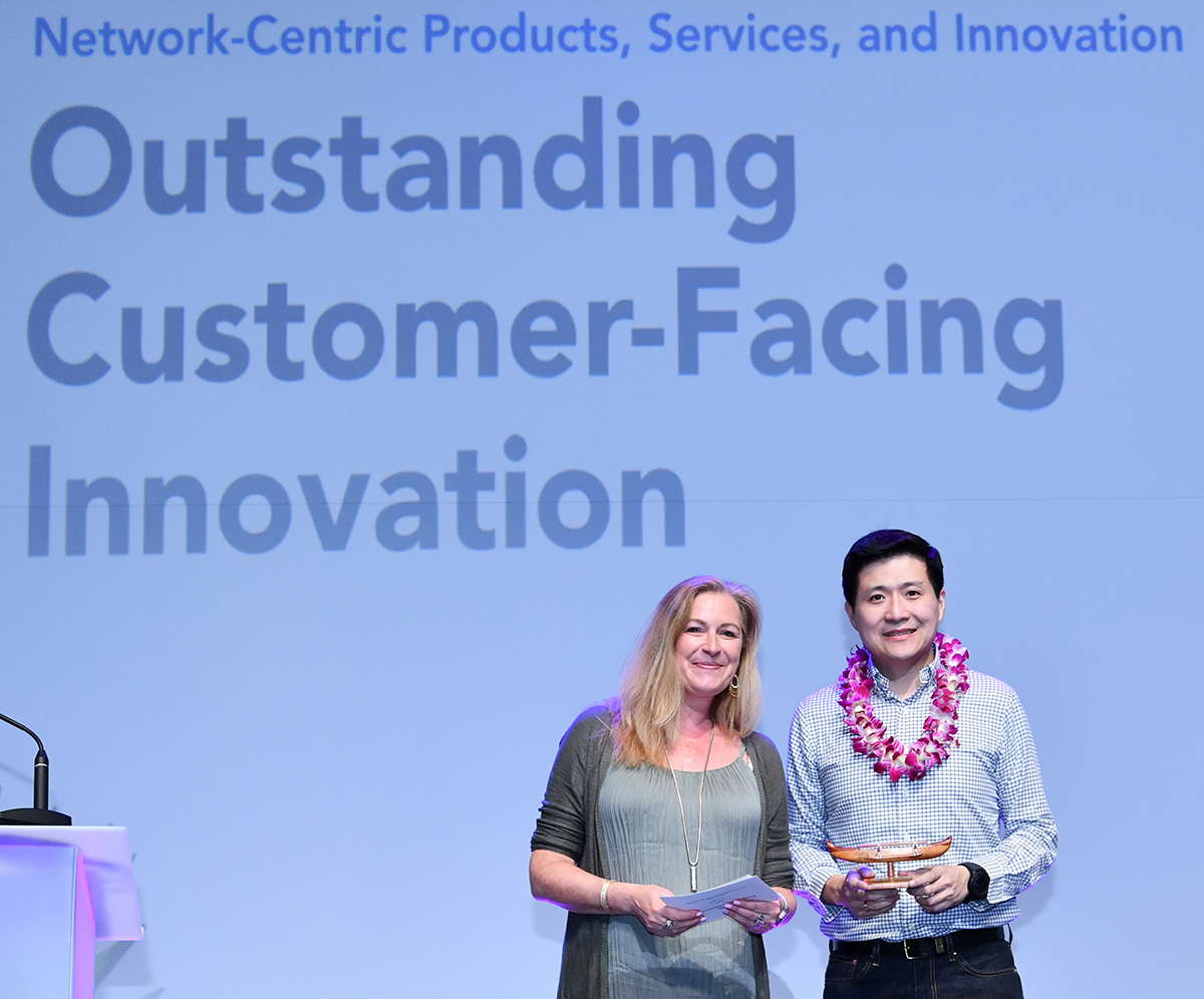 PLDT Global Corporation Country Head for Americas and Pacific James Melon with the award for Outstanding Customer-Facing Innovation